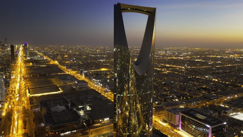 Drone shot flying. Saudi Arabia. Riyadh. Kingdom tower. Sunset. Evening.