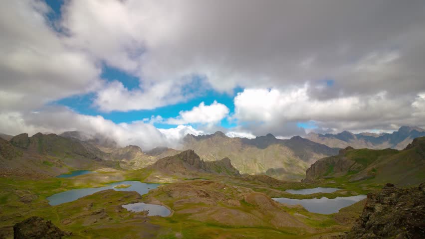 Nature time lapse video. Lakes on the top of hill and motion of the clouds. Landcape concept 4k timelapse.