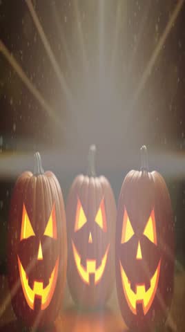 Halloween pumpkin Jack O Lantern face background party autumn 2024. Smile and scary eyes Jack o lanterns seamless loop, horizontal banner, halloween night decorative. 31st october event 4K video 