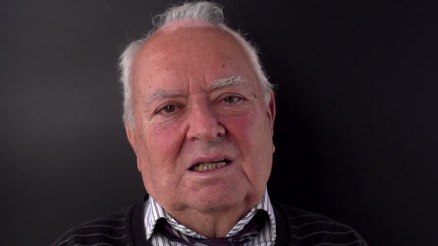 slow motion shot of a nice elderly man being slapped across the face, shot with the sony FS700