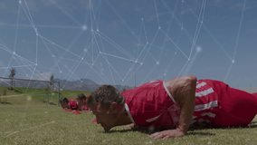 Soccer players doing push-ups over network connections animation on field. exercise, teamwork, virtual, fitness, training, sports - Powered by Shutterstock - Get 15% off with code: PIKWIZARD15