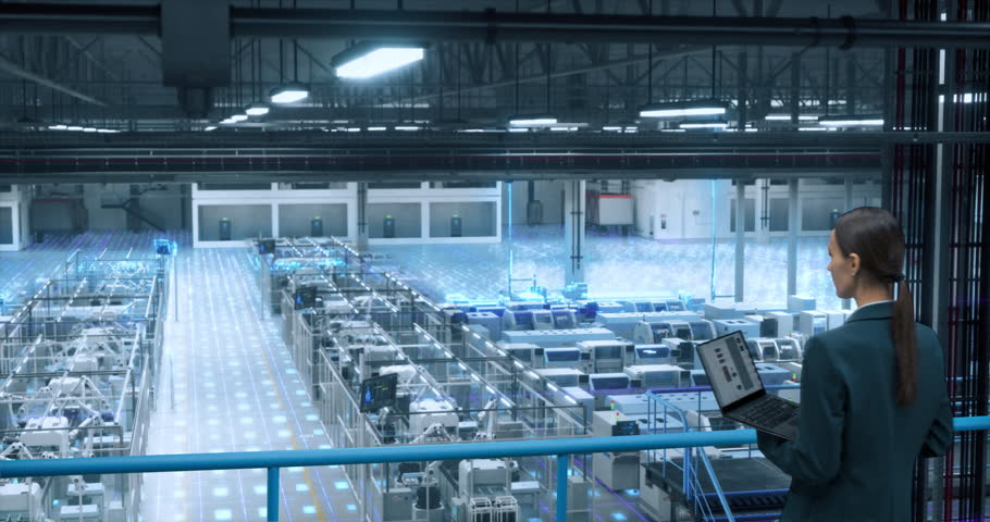 Factory Digitalization Visual Transformation: Female Engineer Uses Laptop to Activate Construction of Autonomous Robot Arm Industrial Facility. Industry Four Machinery Manufacturing of Products