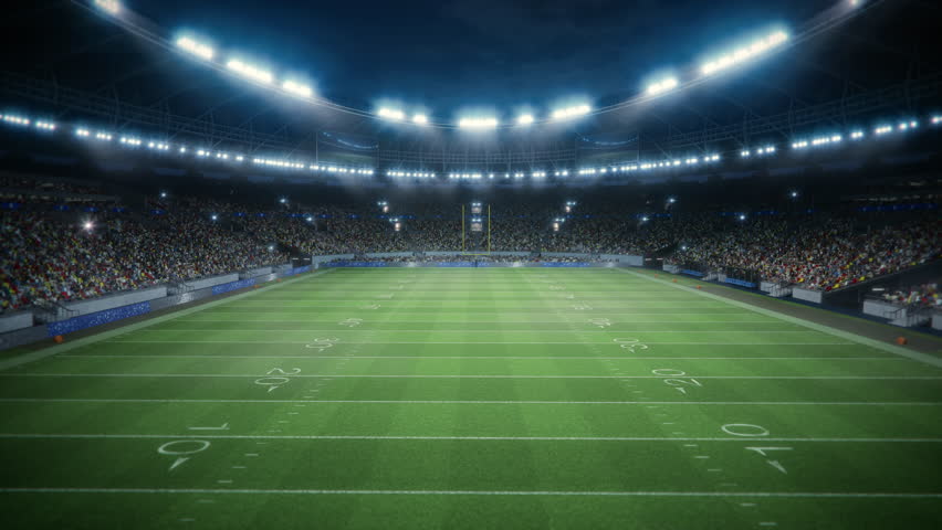 Night Aerial Elevating View of an American Football Stadium With Enthusiastic Fans. Field of a Major Championship Game, Capturing the Anticipation and Energy of the Spectators with Start of the Game