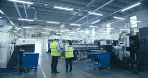 Two Engineers in Safety Vests Use a Tablet to Interact With Holographic Data in a High-tech Factory, Activate AI Facility Analysis, Advanced Machinery, Digital Interfaces, Futuristic Manufacturing - Powered by Shutterstock - Get 15% off with code: PIKWIZARD15