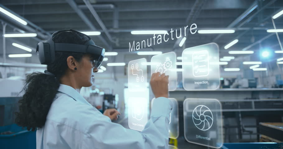 Female Engineer in VR Headset Designs a 3d Engine Model in a High-tech Factory, Interacting With Virtual Components and Digital Interfaces. Holographic Displays Futuristic Enginnering Concept