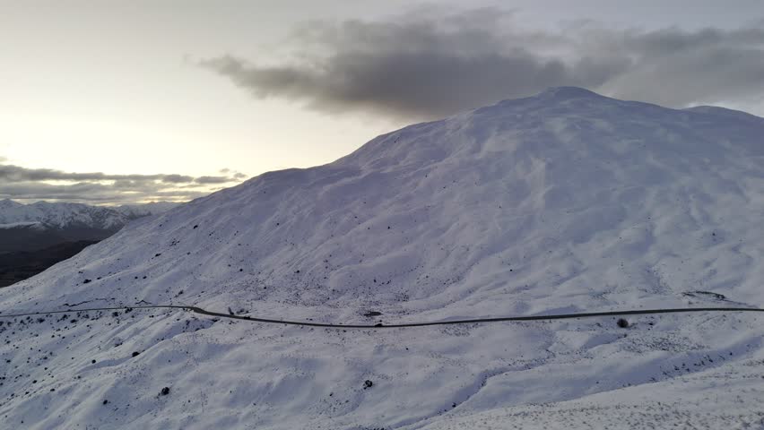 wide angle shot of the crown range Queenstown New Zealand social influencer stock footage