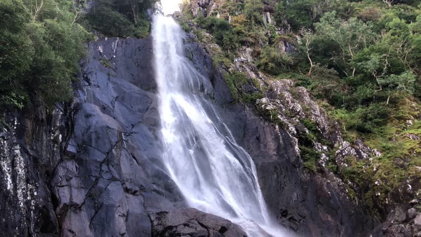 Water flows down the Aber Falls waterfall in Wales, UK. 03.09.24