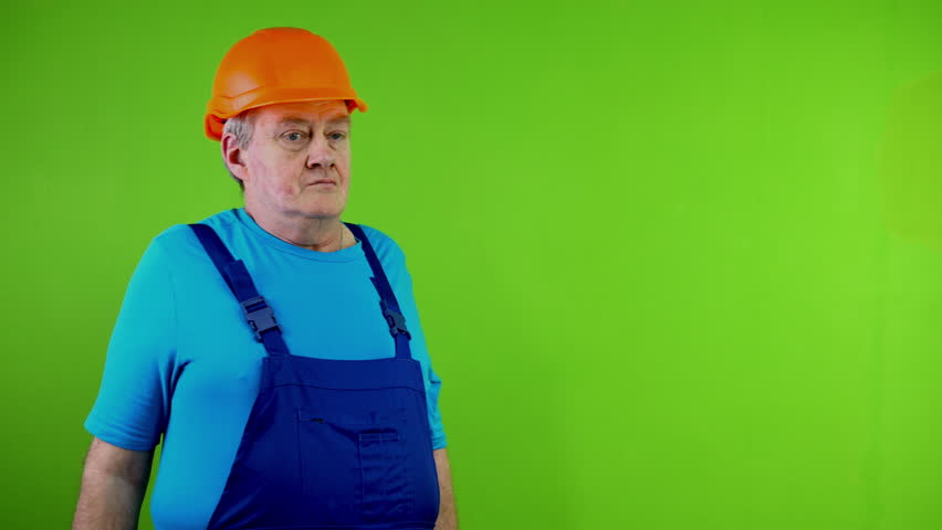 Tired senior worker massaging stiff neck, tensed muscles, turns head of overworking.