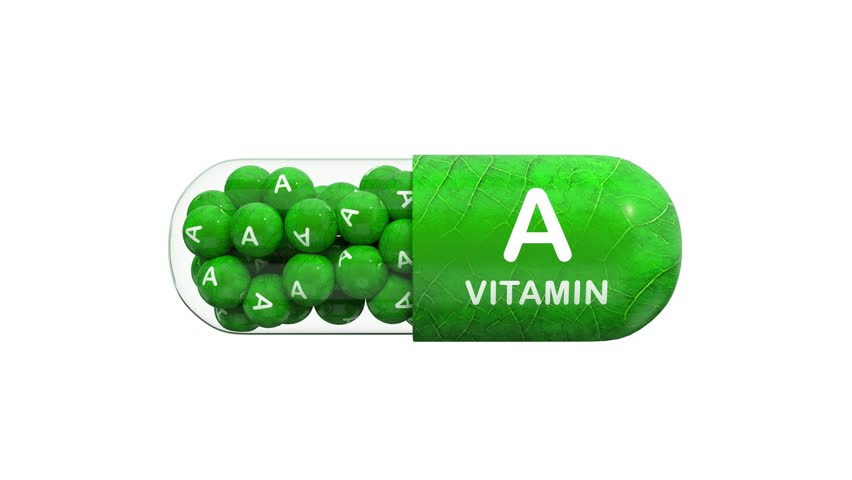 A 3D animated model of vitamin A in the form of green granules, pills or tablets. Seamless loop. 3D rendering. Isolated on a white background.