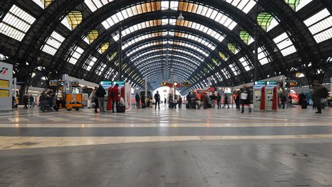 MILAN, ITALY - MARCH 23: (Timelapse View) People walking in Central station on March 23, 2013 in Milan, Italy. Every day about 320,000 passengers pass through the station. 