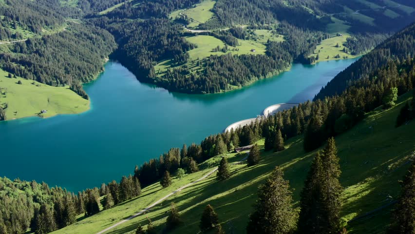 A landscape scene of Lac du Vieux Emosson turquoise lake and mountains in Switzerland, for wallpaper