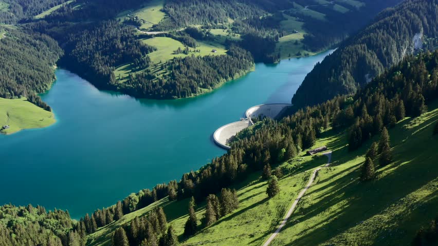 A landscape scene of Lac du Vieux Emosson turquoise lake and mountains in Switzerland, for wallpaper