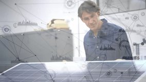 Inspecting solar panel, engineer with network connections animation overlaid. Renewable, energy, technology, innovation, sustainable, electricity - Powered by Shutterstock - Get 15% off with code: PIKWIZARD15