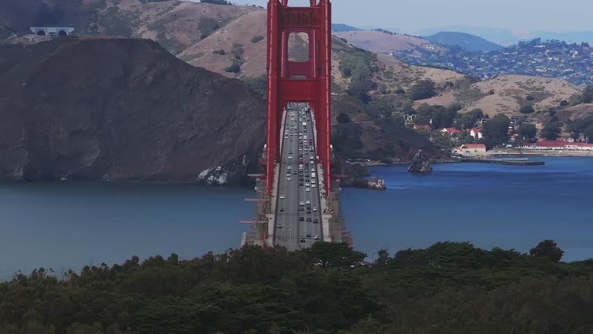 Aerial view of Golden Gate Bridge in San Francisco. Iconic golden gate bridge spanning the bay with scenic water and urban landscape, San Francisco, United States.