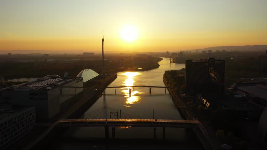 Aerial - Glasgow City from above during sunset in Scotland.