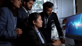 Young Indian investors professionals, expressing disappointment in the office after witnessing a stock market crash on a laptop, reacting to the financial downturn. - Powered by Shutterstock - Get 15% off with code: PIKWIZARD15