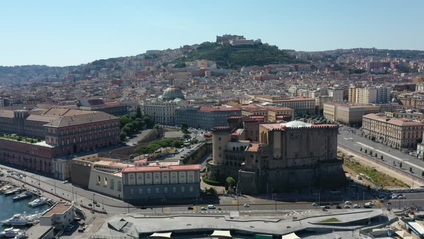 Aerial view of central Naples with medieval Castel Nuovo in summer on a sunny day, Campania, Italy, Europe