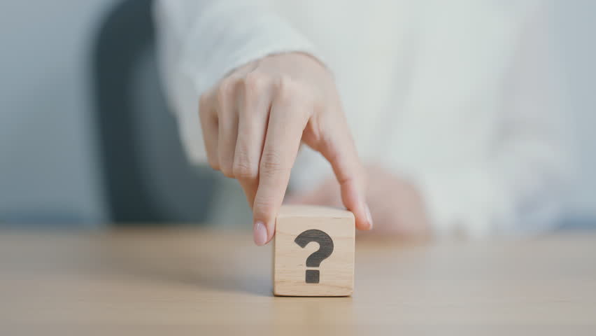 Wood block of Questions Mark ( ? ) sign. FAQ, frequency asked questions, Answer, Q and A, Information, Communication and interrogation Concepts