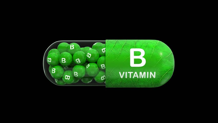 A 3D animated model of vitamin B in green granule, pill or tablet form. Seamless loop. 3D rendering. Isolated on a black background.