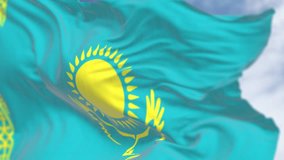 Close-up of Kazakhstan national flag waving on a clear day. Seamless 3d render animation. Slow motion loop. Selective focus - Powered by Shutterstock - Get 15% off with code: PIKWIZARD15
