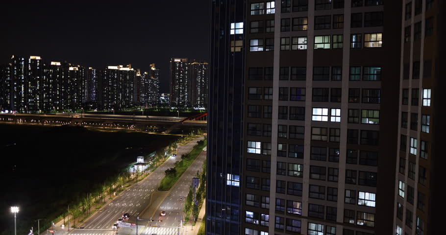 View from skyscraper apartment on a big city streets at nigh. Shot in South Korea