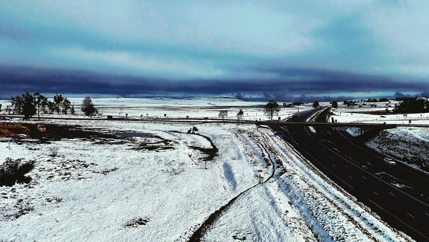 This is aerial footage of a rare snowfall in the Midlands region of KwaZulu-Natal, South Africa. Perfect for travel, nature, and weather-related content, it shows the unexpected beauty of snow.