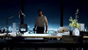 Architect Reviewing Blueprints In High-Rise Office At Night Project Planning Urban Design Innovation - Powered by Shutterstock - Get 15% off with code: PIKWIZARD15
