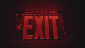 Red exit sign in the dark. Exit emergency sign in red. The red way out announcement on the dark background.  - Powered by Shutterstock - Get 15% off with code: PIKWIZARD15