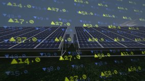 Solar panels and wind turbine with financial data animation overlaid. Renewable, sustainable, green energy, solar energy, wind power, financial growth - Powered by Shutterstock - Get 15% off with code: PIKWIZARD15