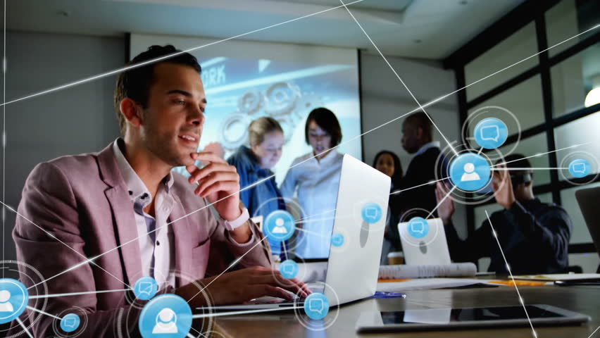 Networking and communication icons animation over business people working in office. teamwork, technology, collaboration, strategy, meeting