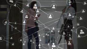 Network of connections and social interaction animation over businesswomen in office hallway. networking, team, professional, collaboration, communication, corporate - Powered by Shutterstock - Get 15% off with code: PIKWIZARD15