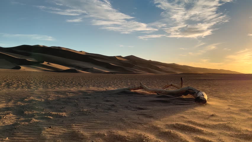 Windswept desert sunrise extreme environment climate change Great Sand Dunes National Park Colorado USA travel tourism