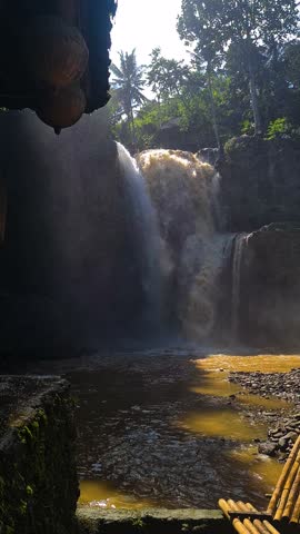 Vertical View of Tegenungan Waterfall in Jungle of Bali Island, Indonesia