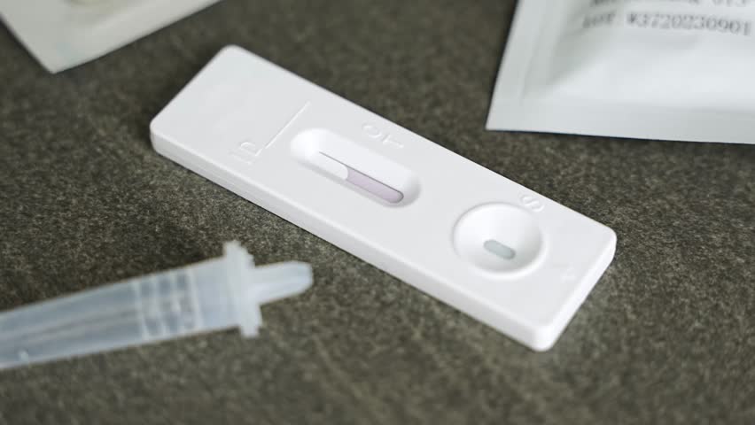 Rapid Antigen Test kit with with negative result during swab COVID-19 testing. Coronavirus Self nasal or Home test, Autumn exacerbation of viruses. High quality 4k footage