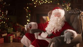 Santa telling fairytales and congratulations, portrait of Santa Claus in home. Magical and fabulous Xmas night, miracle in Christmas eve, traditional religious festival, medium shot, slow motion - Powered by Shutterstock - Get 15% off with code: PIKWIZARD15