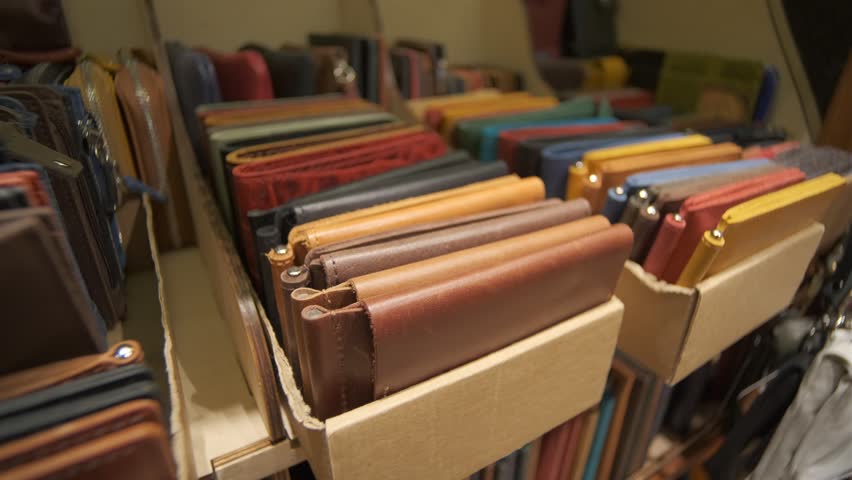 Colorful leather wallets beautifully displayed in the store for customers to explore