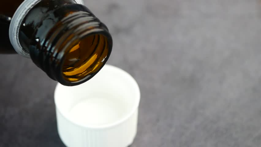 A dose of cough syrup.