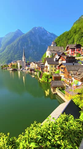 Experience the breathtaking view of Hallstatt, Austria, by the tranquil lake and majestic mountains