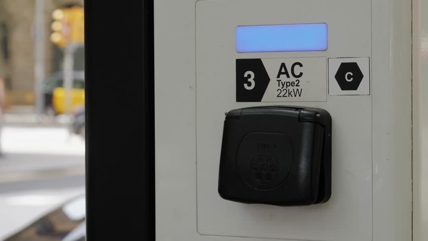A Modern Electric Vehicle Charging Station Strategically Located in an Urban Setting for Convenience