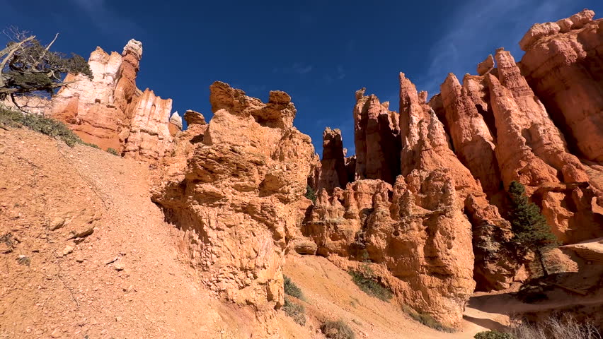 Dramatic Hoodoo rock formations from extreme weather environmental erosion in Bryce Canyon National Park Utah USA travel tourism