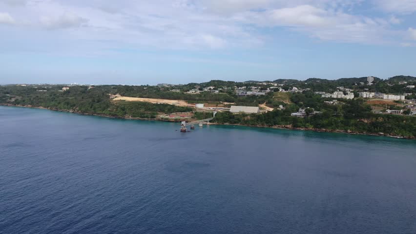 An aerial footage of the Muelle de Azucar (Sugar Pier) on a cloudy day in Borinquen, Aguadilla, Puerto Rico