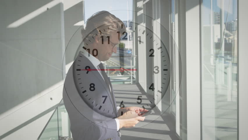 Clock animation over businessperson holding smartphone in modern office hallway. technology, digital, time, productivity, corporate, innovation