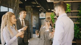 A vibrant networking event for professionals to engage in meaningful conversations over coffee in a modern, collaborative office space - Powered by Shutterstock - Get 15% off with code: PIKWIZARD15