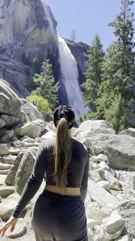 Beautiful tourist woman near Nevada Falls, Strong High Falls, hike to Waterfalls, Yosemite National Park, Landscape and hiking in the USA, Vernal and Nevada Falls foggy trail, trail, hiking, nature