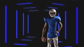 Football player holding ball, futuristic blue lights animation in background. Sports, athlete, neon, technology, competition, teamwork - Powered by Shutterstock - Get 15% off with code: PIKWIZARD15