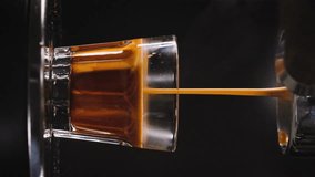 Coffee machine filling glass with black espresso - Powered by Shutterstock - Get 15% off with code: PIKWIZARD15