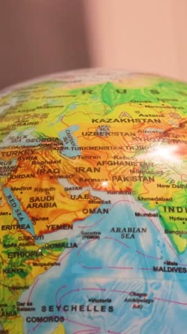 On the globe, the Arabian Peninsula or Gulf and the Middle East are shown, including Saudi Arabia, the UAE, Oman, Yemen, Kuwait, Bahrain, Qatar, Jordan, and others.