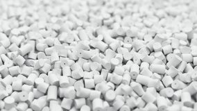 Fly around pile of white plastic polypropylene granules, masterbatch polymer grain. HDPE or PVC resin pellets. 3d render animation. 3D Illustration - Powered by Shutterstock - Get 15% off with code: PIKWIZARD15