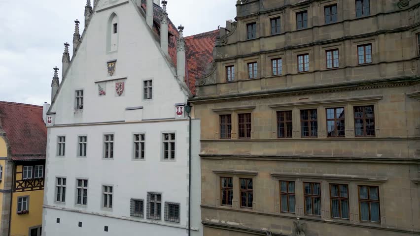 4K Aerial Drone Video of the Historic Town Hall Tower on the Market Square of Rothenburg, Germany