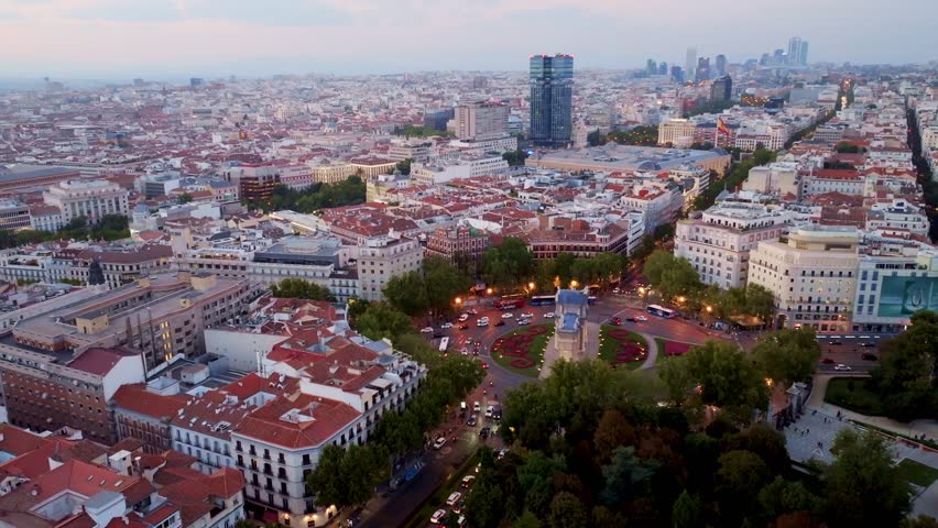 Madrid at sunset, aerial view of Madrid city center at sunset, travel in Madrid, capital of Spain, Madrid in the night lights. High quality 4k footage